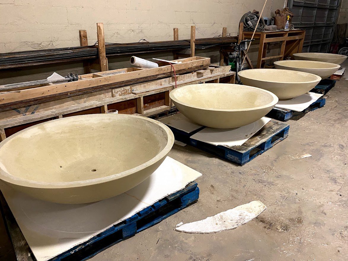 Earthen pots kept in shelf at pottery workshop